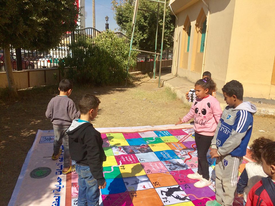 The children of his school in Fayoum have recreational games in the park